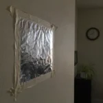 People Are Taping Aluminium Foil To Their Walls